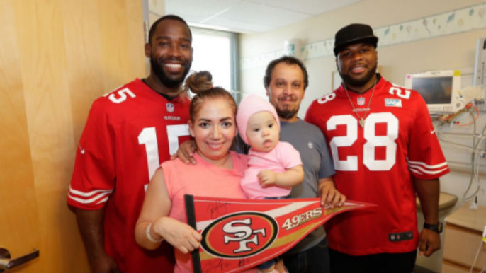 49ers deliver baskets of hope to local hospital